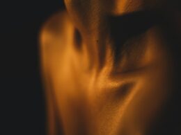 a blurry photo of a person's torso